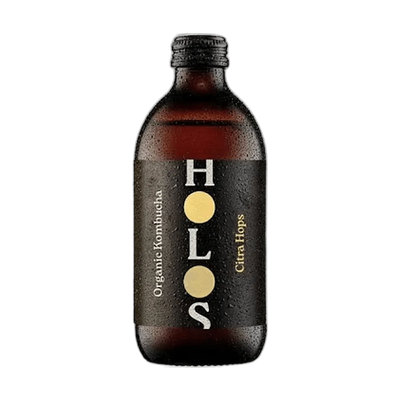HOLOS Citra Hops raw kombucha in an amber 330ml glass bottle with a black cap and a black label with gold dots.