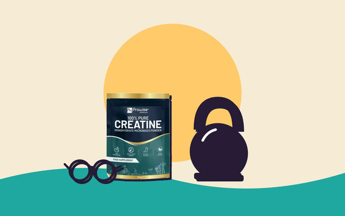 A tub of creatine next to a kettlebell and a pair of reading glasses