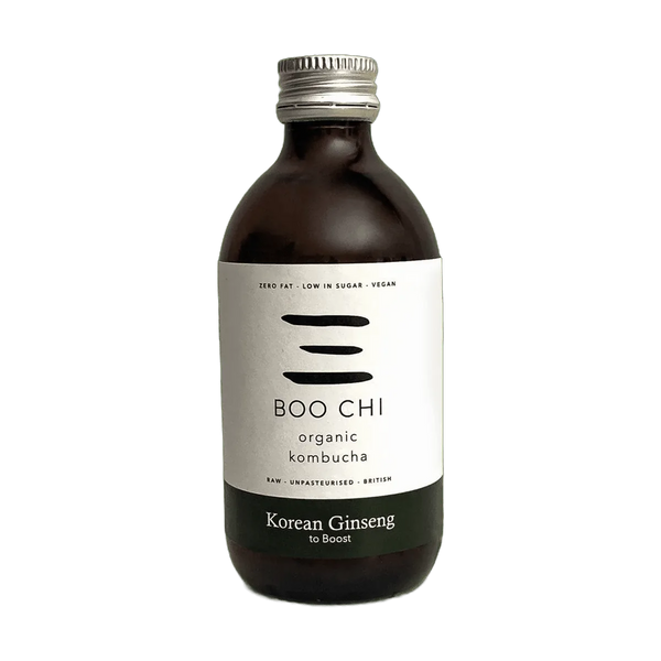 Boo Chi Korean Ginseng raw kombucha in an amber 330ml glass bottle with a silver cap and a white label with a dark green flavour band.
