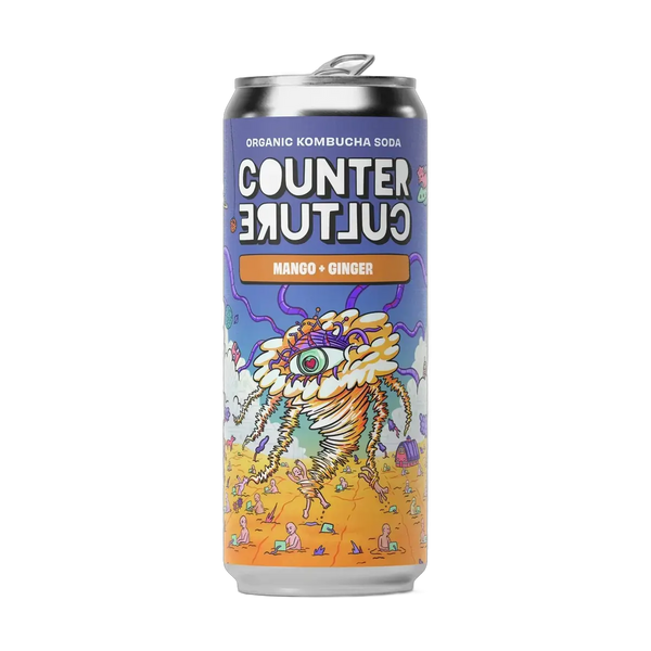Counter Culture Mango & Ginger raw kombucha in a 330ml can with a silver cap and a purple and orange illustrated label.