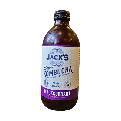 Jack's Blackcurrant raw kombucha in an amber 330ml glass bottle with a black cap and a cream label with a purple flavour band.