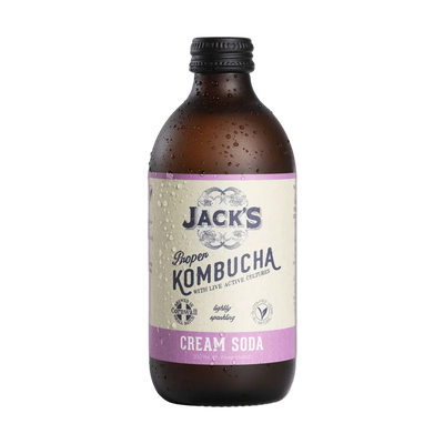 Jack's Cream Soda raw kombucha in an amber 330ml glass bottle with a black cap and a cream label with a lilac flavour band.