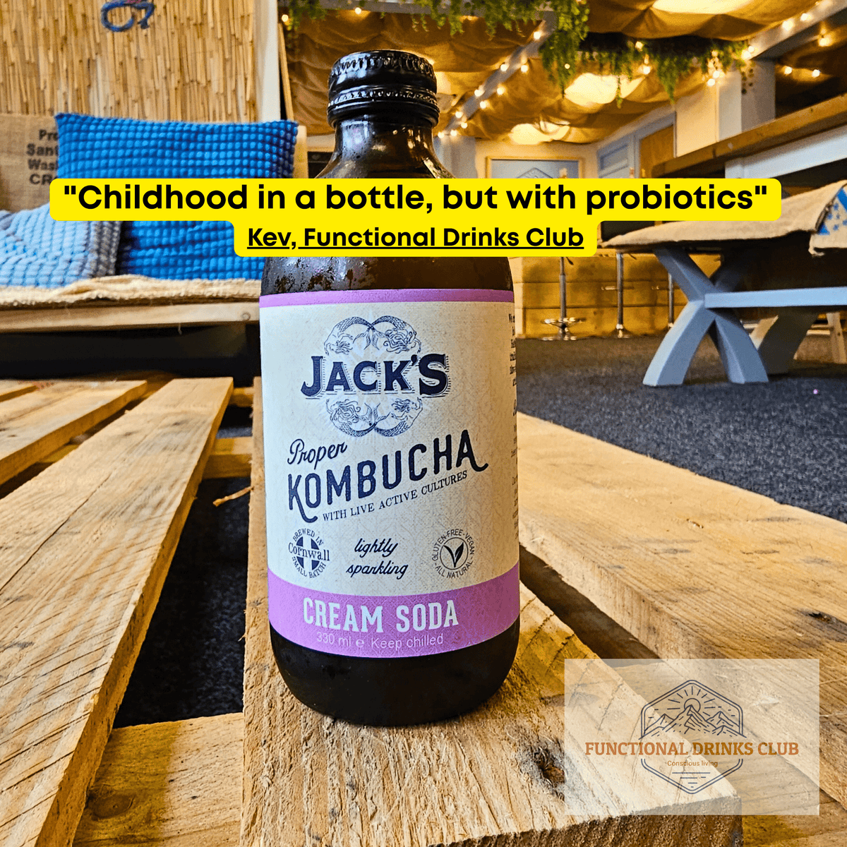 Jack's Cream Soda raw kombucha on a wooden pallet table in the Otley taproom, with Kev's tasting note.