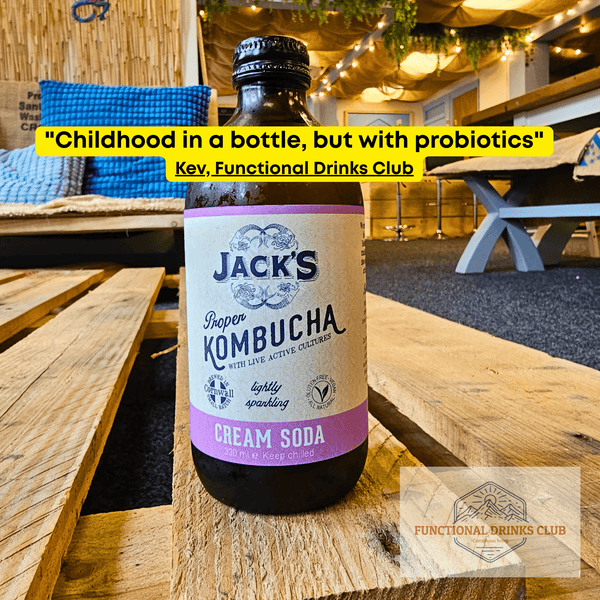 Jack's Cream Soda raw kombucha on a wooden pallet table in the Otley taproom, with Kev's tasting note.