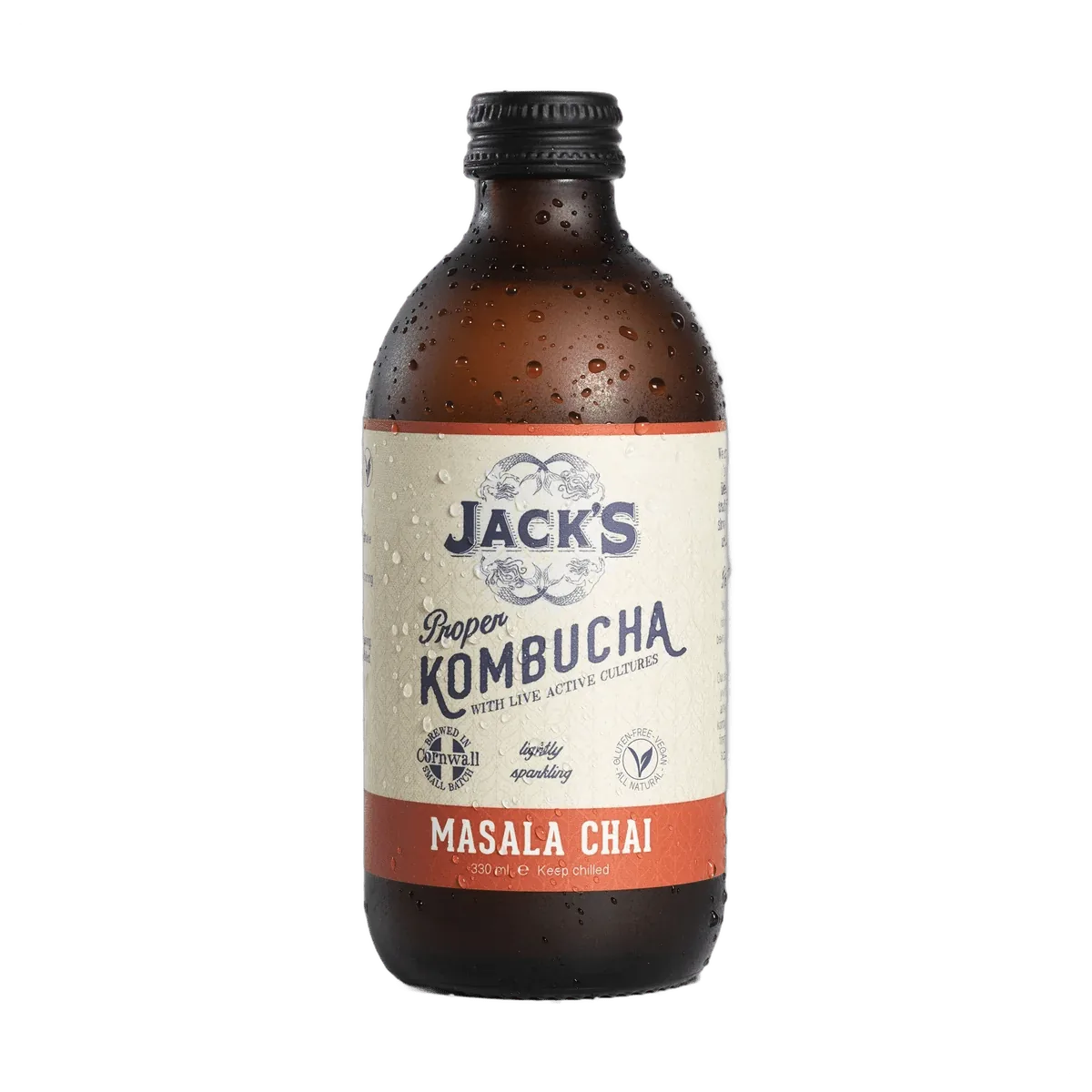 Jack's Masala Chai raw kombucha in an amber 330ml glass bottle with a black cap and a cream label with a burnt orange flavour band.