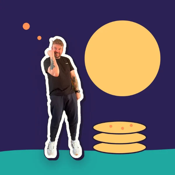 Kev slumped beside a stack of biscuits under a gold moon