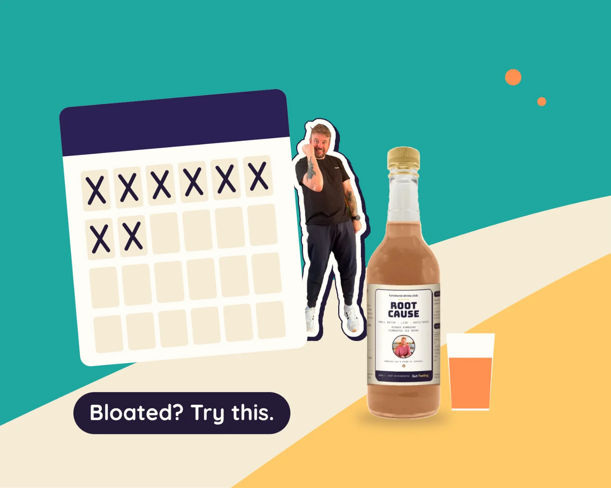 Gut Feeling Root Cause ginger kombucha and a small glass beside a calendar of crossed-off days, with Kev celebrating: the 30-Day Gut Health Challenge