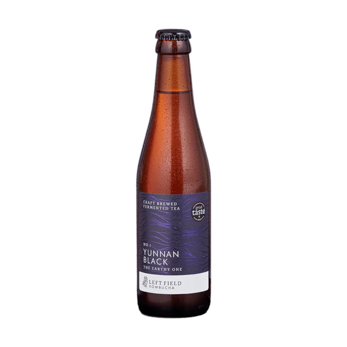 Left Field No.1 Yunnan Black raw kombucha in a tall amber 330ml glass bottle with a black cap and a deep purple wave-patterned label.