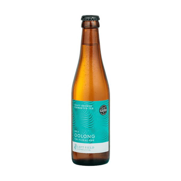 Left Field No.3 Oolong raw kombucha in a tall amber 330ml glass bottle with a black cap and a turquoise swirl-patterned label.