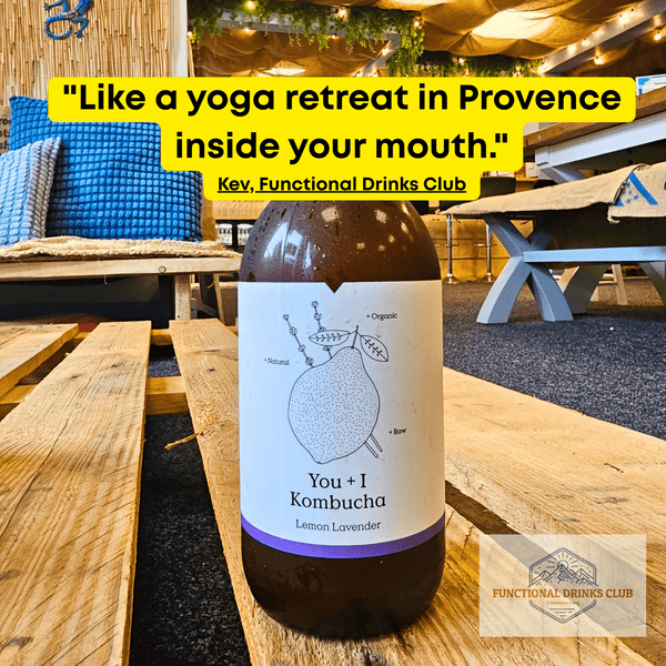 You + I Lemon & Lavender raw kombucha on a wooden pallet table in the Otley taproom, with Kev's tasting note: "Like a yoga retreat in Provence inside your mouth."