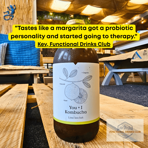 You + I Lime & Sea Salt raw kombucha on a wooden pallet table in the Otley taproom, with Kev's tasting note.